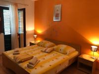 Posteľ alebo postele v izbe v ubytovaní Apartment Ruža
