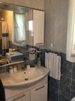 Kúpeľňa v ubytovaní Apartment Ruža