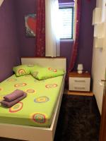 Posteľ alebo postele v izbe v ubytovaní Apartment Ruža