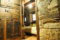 A bed or beds in a room at Casa O´Crego