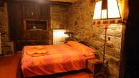 A bed or beds in a room at Casa O´Crego