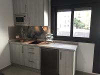 Kuchyňa alebo kuchynka v ubytovaní Apartamentos Villa Serali Parking Gratis