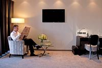 ホテル ファヴォールにあるテレビまたはエンターテインメントセンター