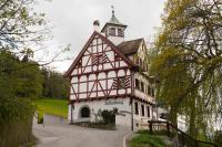 a building with a clock tower on top of it at Hotel Restaurant Falkenburg in St. Gallen