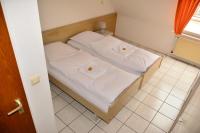 Postel nebo postele na pokoji v ubytování Hotel Wilhelmshöhe