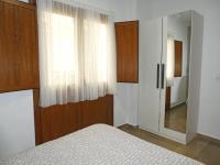 A bed or beds in a room at Apartamentos Catedral Plaza 3000