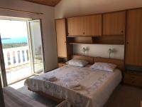 Postel nebo postele na pokoji v ubytování Apartment Santa Marina