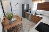 Kuchyňa alebo kuchynka v ubytovaní Alojamiento Armenia Piscina