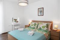 Posteľ alebo postele v izbe v ubytovaní Comfortable 3-Bedroom Apartment with Balcony and Fast Wi-Fi - 10 Minutes from Old Town