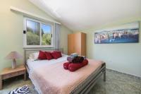 Posteľ alebo postele v izbe v ubytovaní Apartments 7+