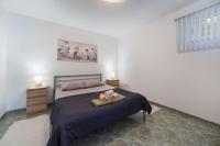 Posteľ alebo postele v izbe v ubytovaní Apartments 7+