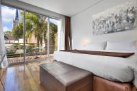 San Isidro Plaza Hotelにあるベッド