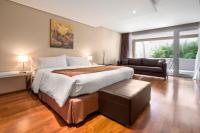 San Isidro Plaza Hotelにあるベッド