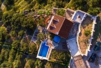 an overhead view of a house with a swimming pool at Villa Pina in Makarska, private pool in Makarska