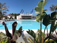 a large swimming pool in front of a building at Delamar 4*Sup-Adults only (18+) in Lloret de Mar