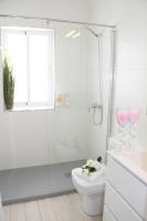 A bathroom at Shiny Per Family Apartment