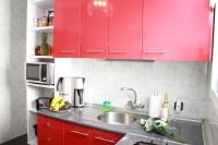 A kitchen or kitchenette at Shiny Per Family Apartment