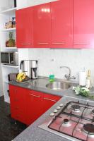 A kitchen or kitchenette at Shiny Per Family Apartment