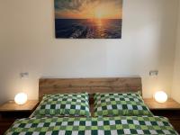 Postel nebo postele na pokoji v ubytování Apartmán Monny
