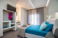 Posteľ alebo postele v izbe v ubytovaní Passas Inn Luxury Living