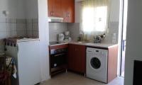 Kuchyň nebo kuchyňský kout v ubytování Petasos Apartments 1