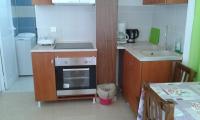Kuchyň nebo kuchyňský kout v ubytování Petasos Apartments 1