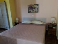 Postel nebo postele na pokoji v ubytování Petasos Apartments 1