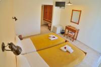 Postel nebo postele na pokoji v ubytování Falassarna Hotel