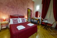 Posteľ alebo postele v izbe v ubytovaní La Locandiera B&B