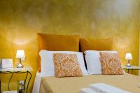 Posteľ alebo postele v izbe v ubytovaní La Locandiera B&B