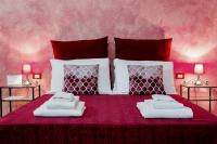 Posteľ alebo postele v izbe v ubytovaní La Locandiera B&B