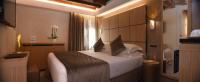 Posteľ alebo postele v izbe v ubytovaní Rosa Salva Hotel