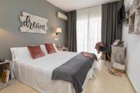 Postel nebo postele na pokoji v ubytování Hotel Bulevard