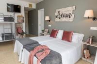 Postel nebo postele na pokoji v ubytování Hotel Bulevard