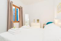 A bed or beds in a room at Can Boeres