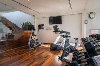 a gym with exercise bikes in a room at Marsella 45 in Hermosillo