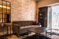 a living room with a couch and a table at Marsella 45 in Hermosillo