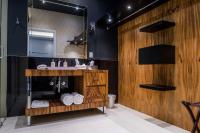 a bathroom with a sink and a mirror at Marsella 45 in Hermosillo