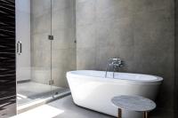 a bathroom with a white tub and a shower at Marsella 45 in Hermosillo