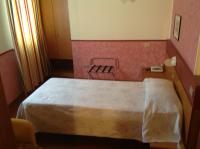 Posteľ alebo postele v izbe v ubytovaní Hotel Roma