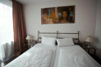 Postel nebo postele na pokoji v ubytování Apartments Hotel Petersburg