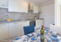 Kuchyň nebo kuchyňský kout v ubytování Apartman Maria