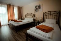 Postel nebo postele na pokoji v ubytování Apartments Hotel Petersburg