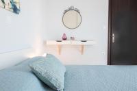 Postel nebo postele na pokoji v ubytování Aesthetic Apartments