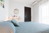 Postel nebo postele na pokoji v ubytování Aesthetic Apartments