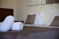 A bed or beds in a room at Casa del mar