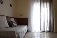 A bed or beds in a room at Casa del mar