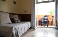 A bed or beds in a room at Casa del mar