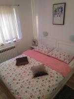 Posteľ alebo postele v izbe v ubytovaní Apartmani Sara i Marta