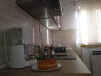 Kuchyňa alebo kuchynka v ubytovaní Apartmani Sara i Marta